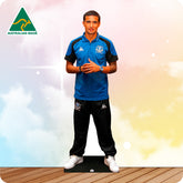 Cardboard cutout of a person wearing a blue and black sports outfit with 'Australian Made' logo in the corner.